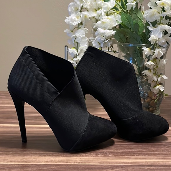 Jessica Simpson Shoes - Jessica Simpson black asymmetrical booties.